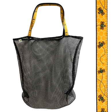 Made to haul all your beach necessities, you will love this bag!  This durable bag is perfect for trips to the beach, park, or local sporting event.  Sturdy black mesh bag with choice of colorful handles Generous size of 23