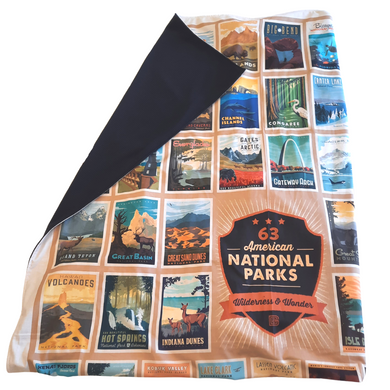 Cover up with this cozy, beautiful throw blanket.  Featuring all 63 American National Parks posters surrounding the Wilderness & Wonder center patch image. This throw blanket is perfect for the National Parks enthusiast in your life. Made in Wisconsin with imported materials.